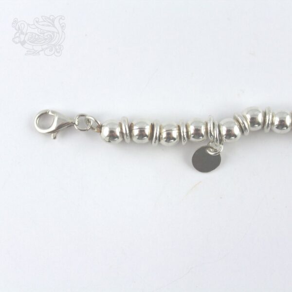 Bracciale-donna-argento-925-palline-ciondoli-anelli-dettaglio-catena